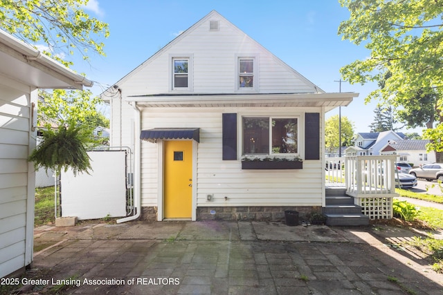 1038 Morgan St, Lansing, MI 48912 - view of front of house featuring a patio area