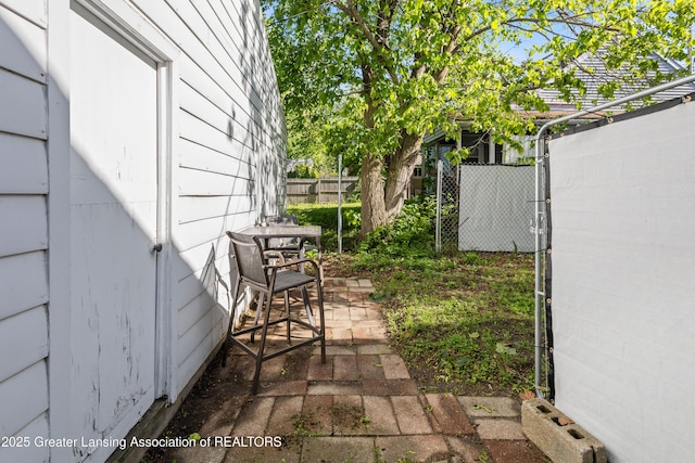 1038 Morgan St, Lansing, MI 48912 - view of patio featuring fence