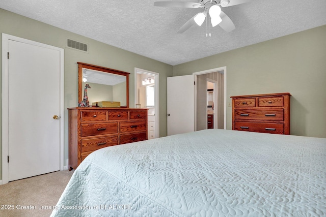 10079 Woodland Acres Dr, Grand Ledge, MI 48837 - bedroom with light carpet, a textured ceiling, and ceiling fan