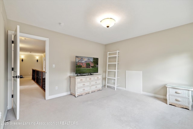 unfurnished bedroom featuring light colored carpet and baseboards