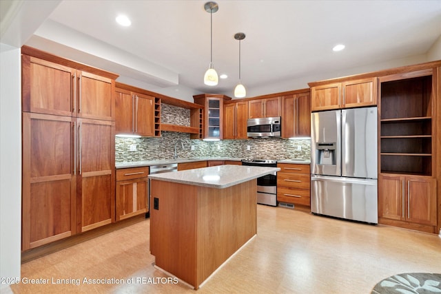 kitchen featuring stainless steel appliances, open shelves, decorative backsplash, light countertops, and hanging light fixtures