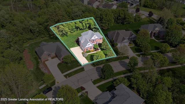aerial view of residential area featuring property boundaries highlighted