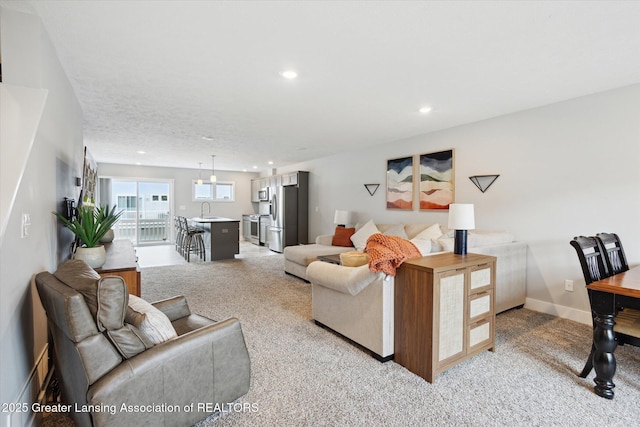 3842 Fossum Ln, Okemos, MI 48864 - living area featuring light colored carpet and recessed lighting