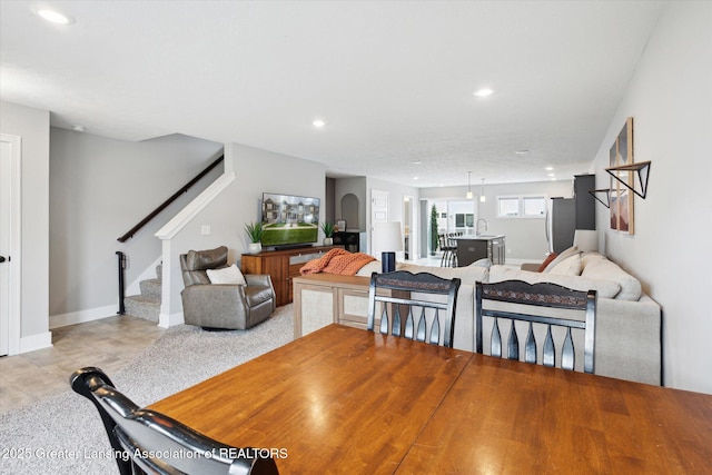 3842 Fossum Ln, Okemos, MI 48864 - living room featuring stairs, recessed lighting, and baseboards