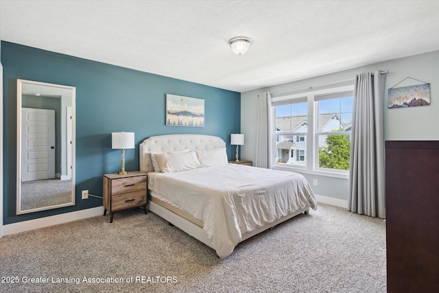3842 Fossum Ln, Okemos, MI 48864 - bedroom featuring carpet flooring, baseboards, and a textured ceiling