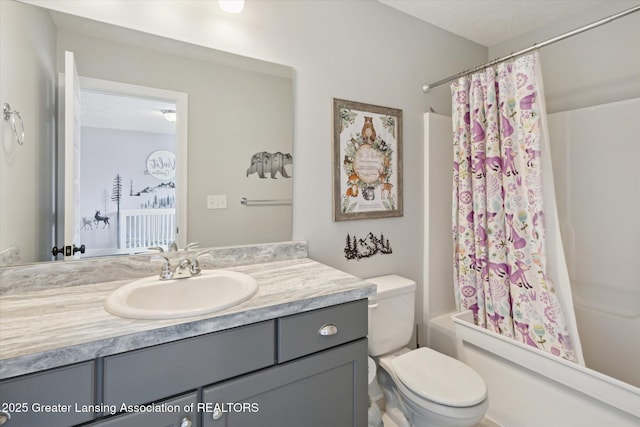 3842 Fossum Ln, Okemos, MI 48864 - full bath with vanity, toilet, and shower / tub combo with curtain