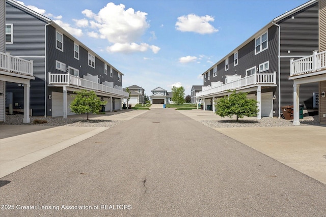3842 Fossum Ln, Okemos, MI 48864 - view of asphalt road featuring a residential view