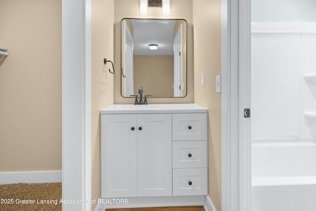 1229 W Saginaw St, Lansing, MI 48915 - bathroom featuring vanity and baseboards