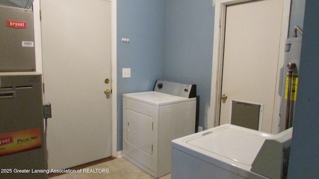 745 Roosevelt St, Mason, MI 48854 - washroom with washing machine and clothes dryer