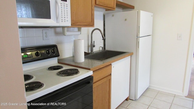 745 Roosevelt St, Mason, MI 48854 - kitchen featuring white appliances, a sink, decorative backsplash, light tile patterned floors, and baseboards
