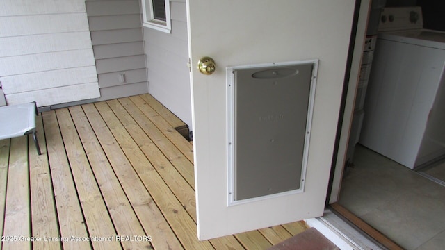 745 Roosevelt St, Mason, MI 48854 - wooden deck featuring washer / clothes dryer