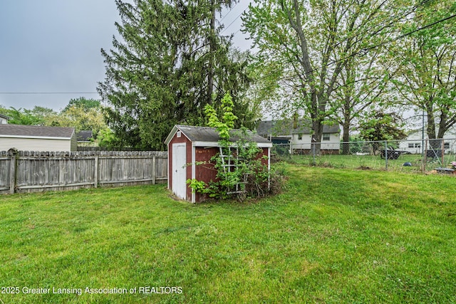 2018 Cooper Ave, Lansing, MI 48910 - view of yard featuring a storage unit and an outdoor structure