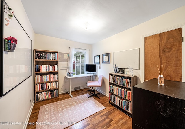 2018 Cooper Ave, Lansing, MI 48910 - home office featuring wood finished floors and baseboards
