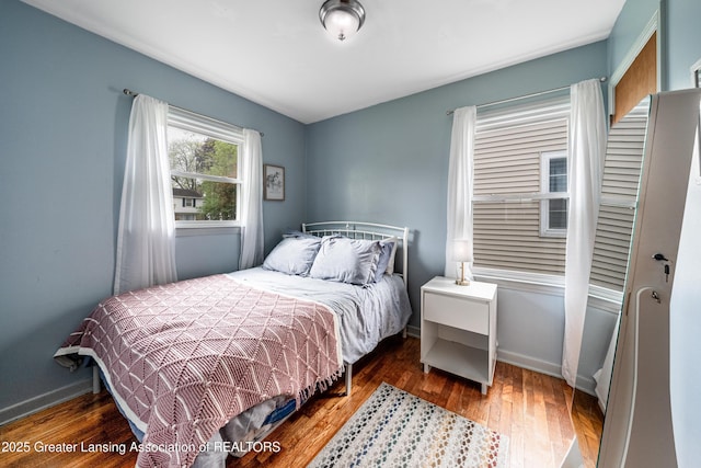 2018 Cooper Ave, Lansing, MI 48910 - bedroom with wood finished floors and baseboards