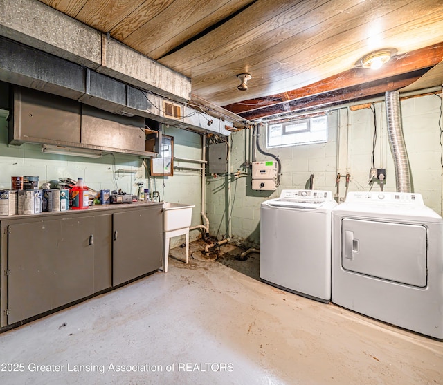 2018 Cooper Ave, Lansing, MI 48910 - below grade area with independent washer and dryer and electric panel