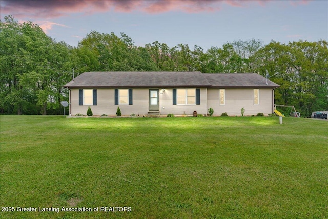 5669 Elm Rd, Olivet, MI 49076 - ranch-style house with a yard and view of scattered trees
