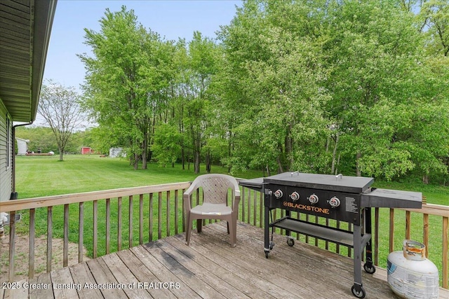 5669 Elm Rd, Olivet, MI 49076 - wooden terrace featuring a lawn