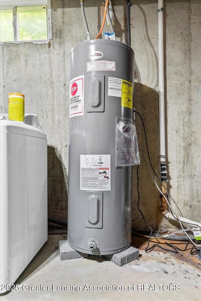 5669 Elm Rd, Olivet, MI 49076 - utility room featuring water heater