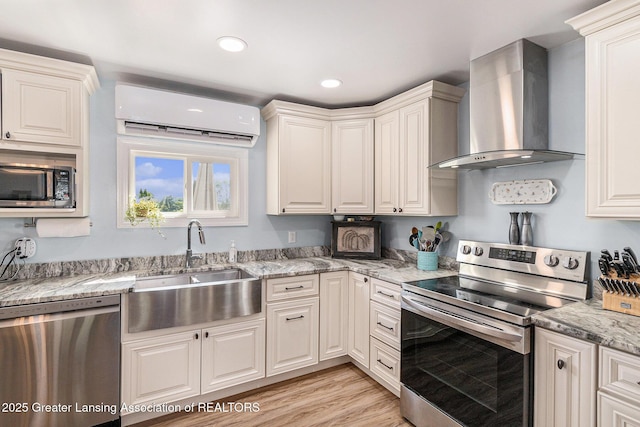 985 Ives Rd, Mason, MI 48854 - kitchen with stainless steel appliances, wall chimney exhaust hood, a sink, a wall mounted air conditioner, and light wood-style flooring