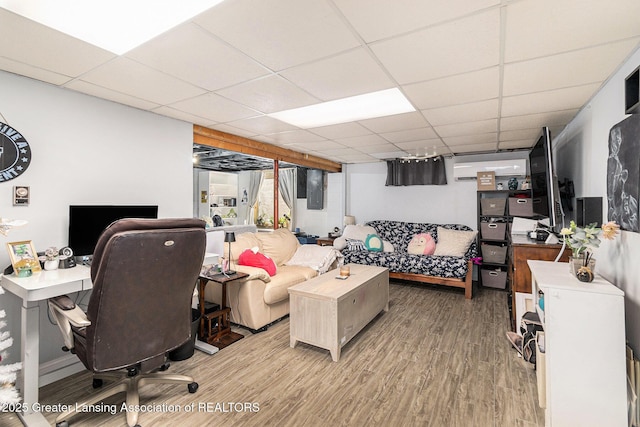 985 Ives Rd, Mason, MI 48854 - office space with wood finished floors and a paneled ceiling