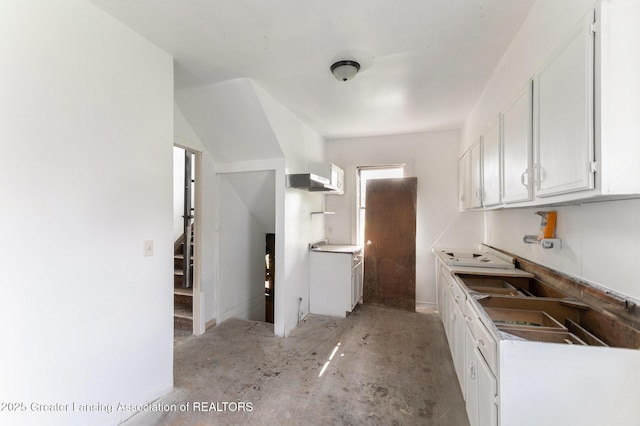 1215 Chittock Ave, Jackson, MI 49203 - kitchen with white cabinetry