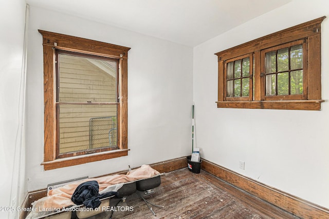 1215 Chittock Ave, Jackson, MI 49203 - unfurnished room with baseboards and hardwood / wood-style flooring