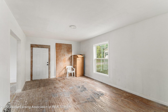 1215 Chittock Ave, Jackson, MI 49203 - empty room featuring hardwood / wood-style floors and baseboards