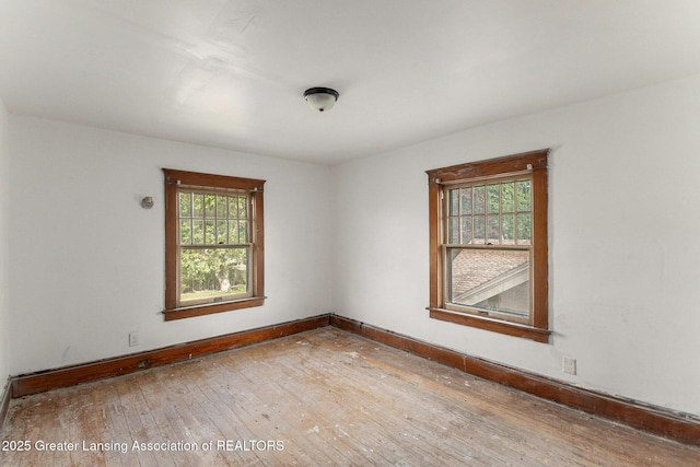 1215 Chittock Ave, Jackson, MI 49203 - empty room featuring hardwood / wood-style flooring and baseboards