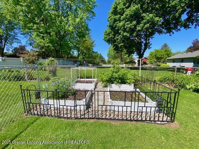 15426 Boichot Rd, Lansing, MI 48906 - view of property's community with a vegetable garden