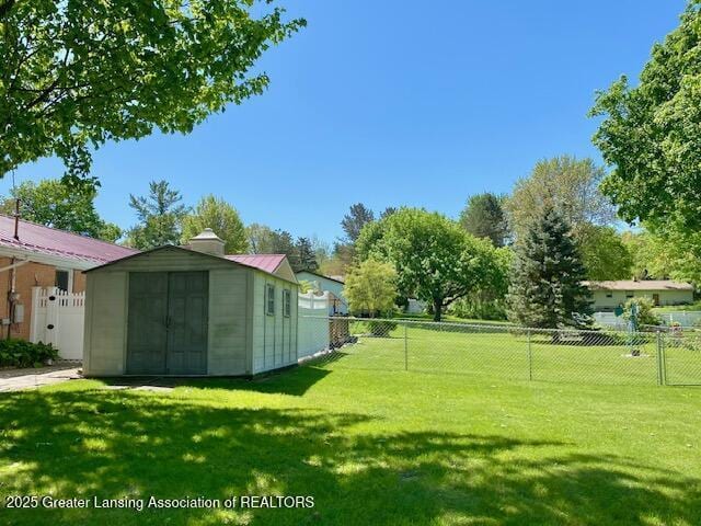 15426 Boichot Rd, Lansing, MI 48906 - view of yard with a storage shed and an outdoor structure