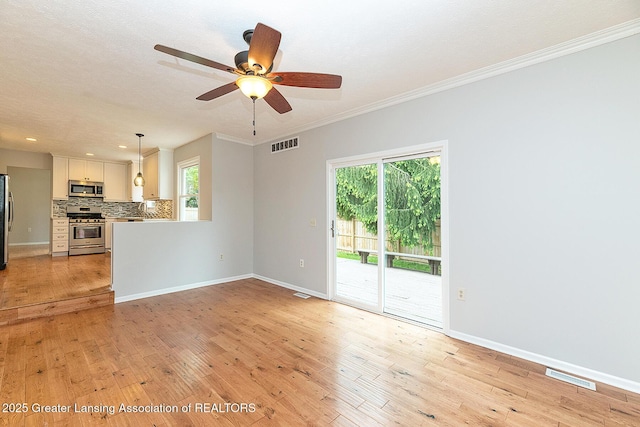 3979 Dayspring Ct, Okemos, MI 48864 - unfurnished living room featuring light wood finished floors, ornamental molding, ceiling fan, baseboards, and recessed lighting