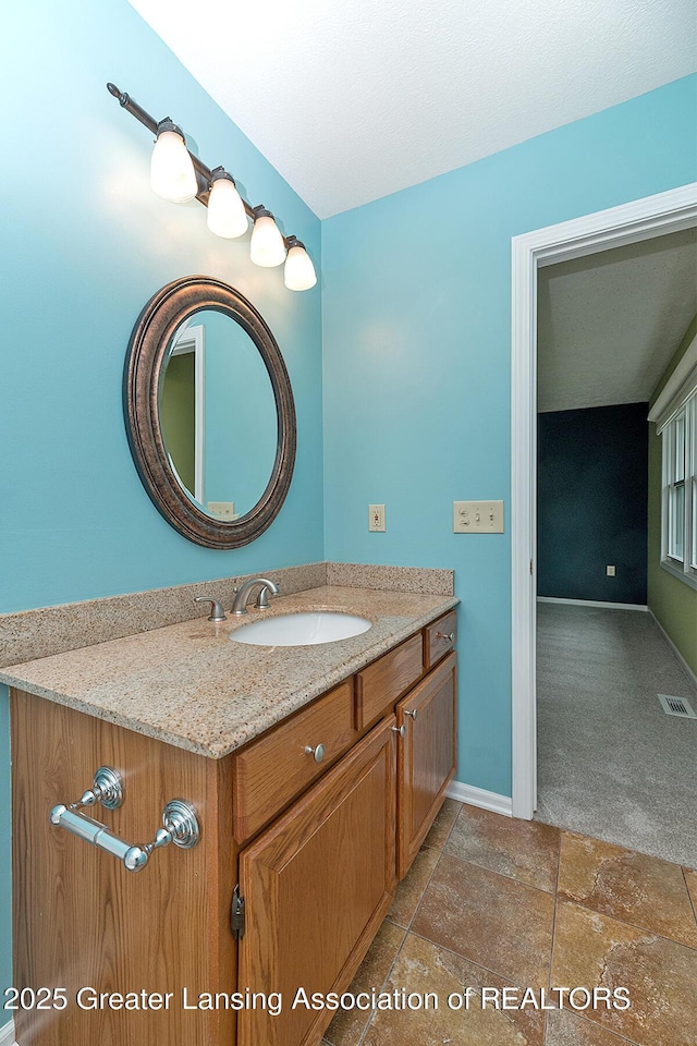 3979 Dayspring Ct, Okemos, MI 48864 - bathroom with baseboards and vanity