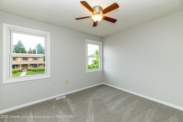 3979 Dayspring Ct, Okemos, MI 48864 - empty room with carpet floors, baseboards, and ceiling fan