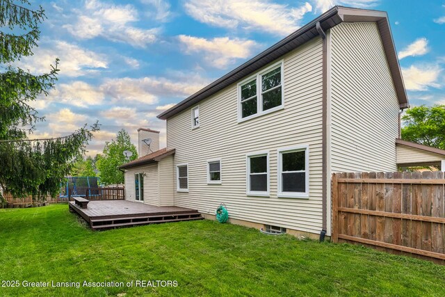 3979 Dayspring Ct, Okemos, MI 48864 - rear view of property with a deck and a chimney