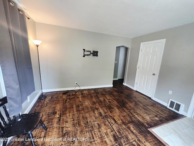 1427 Sheldon St, Lansing, MI 48906 - spare room with wood finished floors and baseboards
