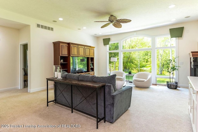 4655 Dimond Way, Dimondale, MI 48821 - living room with light colored carpet, ceiling fan, recessed lighting, and baseboards