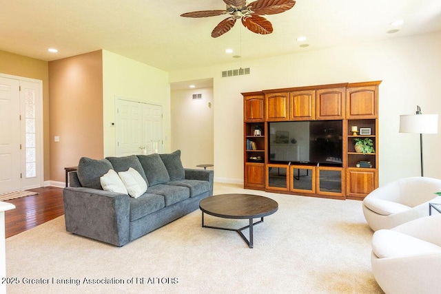 4655 Dimond Way, Dimondale, MI 48821 - living area with ceiling fan, recessed lighting, wood finished floors, and baseboards