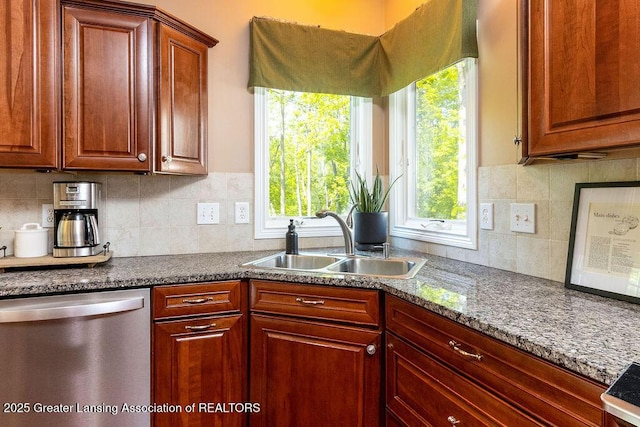 4655 Dimond Way, Dimondale, MI 48821 - kitchen with dishwasher, a sink, dark countertops, and tasteful backsplash