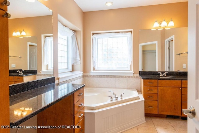 4655 Dimond Way, Dimondale, MI 48821 - full bath with a bath, vanity, and tile patterned flooring