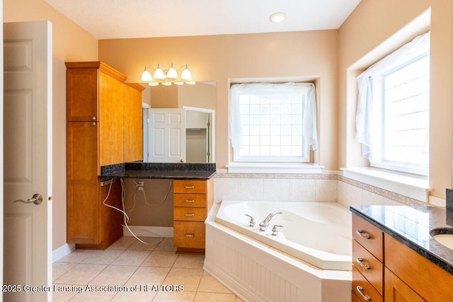 4655 Dimond Way, Dimondale, MI 48821 - full bathroom with vanity, a bath, and tile patterned flooring