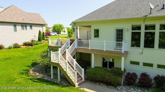 4655 Dimond Way, Dimondale, MI 48821 - rear view of property featuring stairway, a yard, roof with shingles, and a deck
