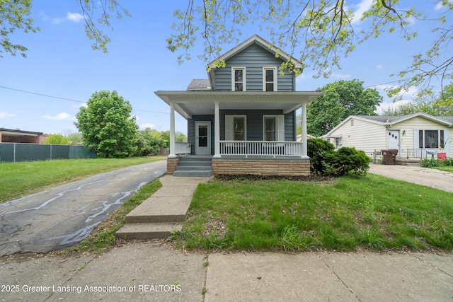 828 Backus St, Jackson, MI 49202 - view of front of property with a porch