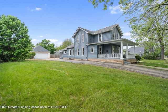 828 Backus St, Jackson, MI 49202 - view of front facade featuring covered porch, a front yard, and a garage