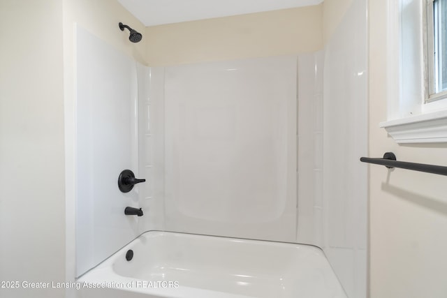 828 Backus St, Jackson, MI 49202 - full bath featuring bathing tub / shower combination
