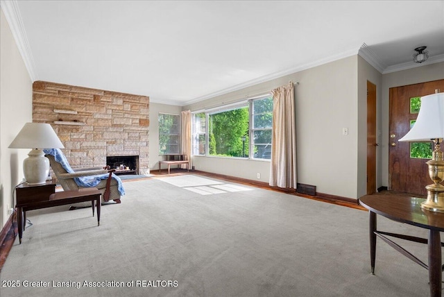 224 S Grace St, Lansing, MI 48917 - living room featuring crown molding, a stone fireplace, and baseboards