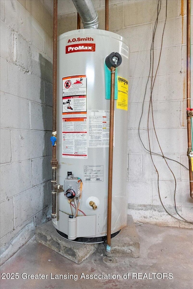 224 S Grace St, Lansing, MI 48917 - utility room featuring water heater