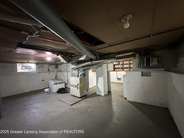312 Jones St, Lansing, MI 48912 - below grade area with heating unit and electric panel