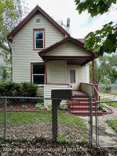 312 Jones St, Lansing, MI 48912 - view of front of property featuring covered porch