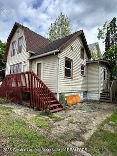 312 Jones St, Lansing, MI 48912 - rear view of house featuring a patio