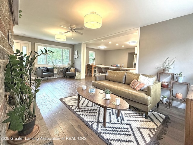 2215 Haslett Rd, East Lansing, MI 48823 - living area with wood-type flooring and a ceiling fan